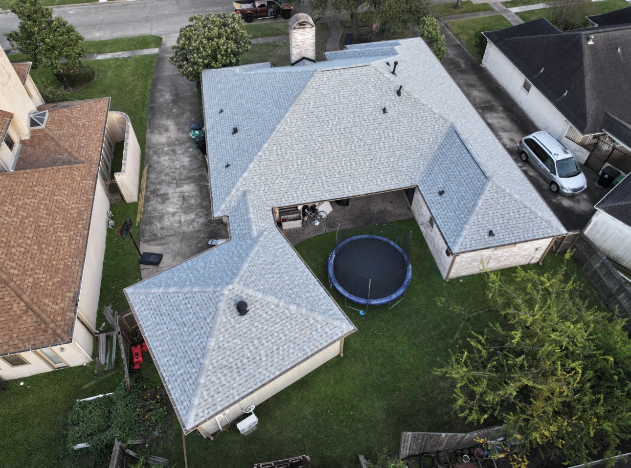 Light gray asphalt shingle roof replacement