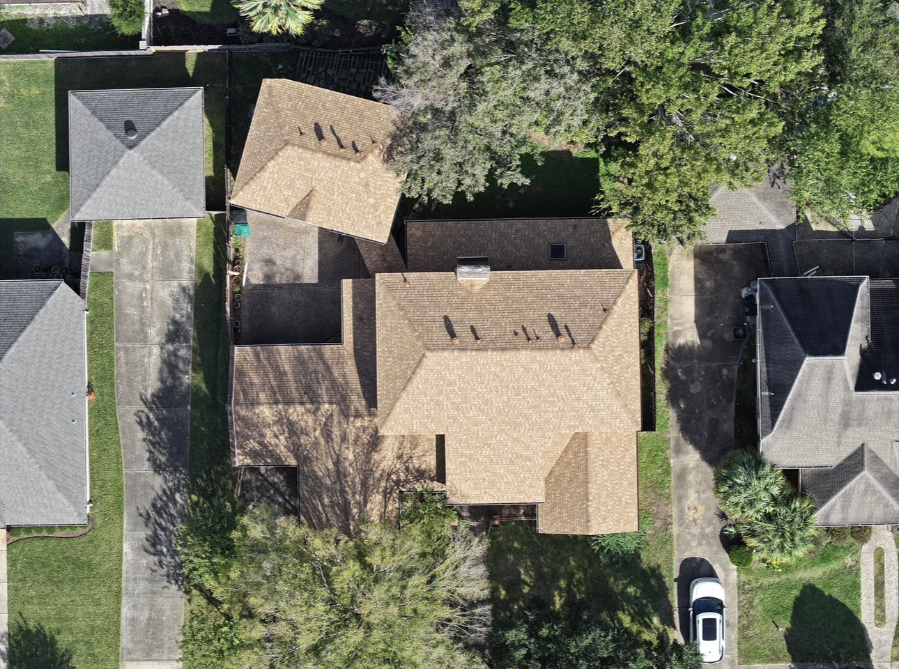 Light brown asphalt shingle roof replacement