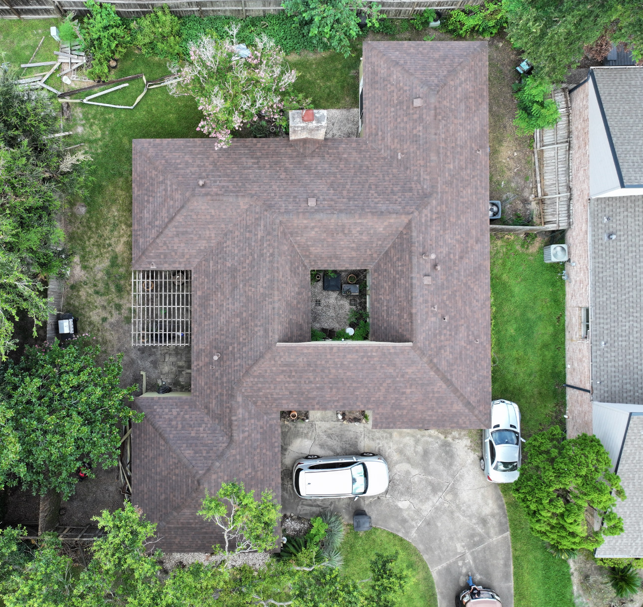 Brown asphalt shingle roof replacement