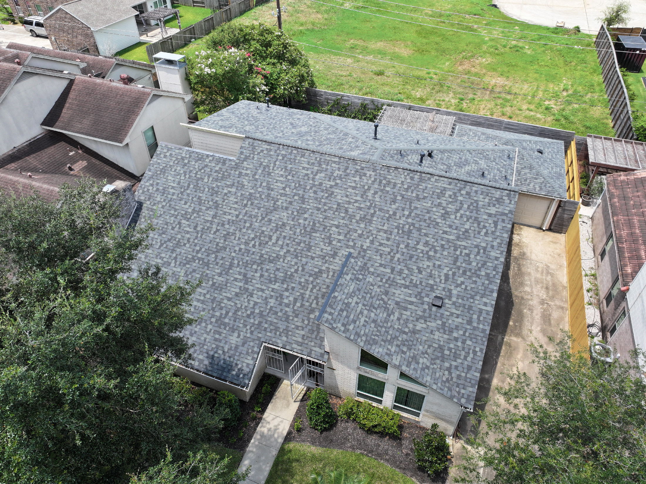 Gray architectural shingle roof replacement