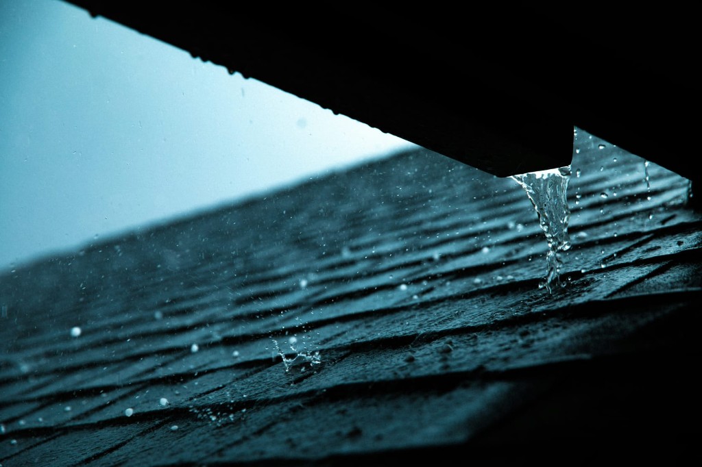 Rain and water runoff on a commercial roof